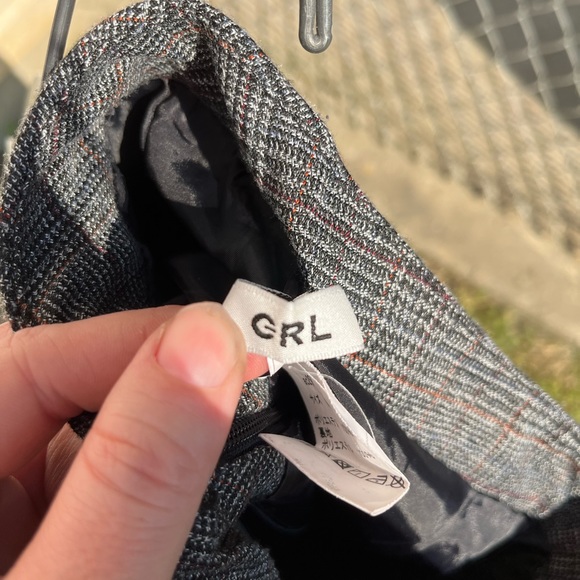 Pleated Mini Skirt With Sailor Style Buttons Down Front - Picture 6 of 6